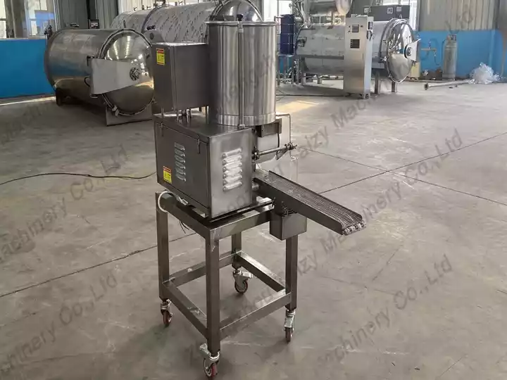 Meat patty former machine