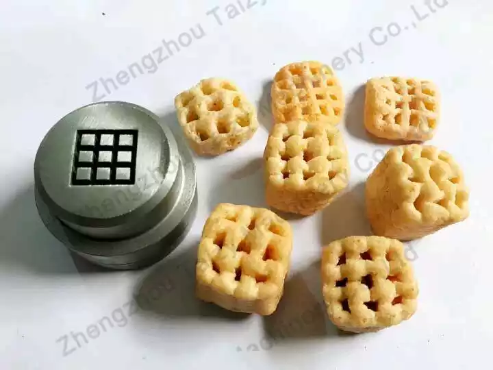 Pillow‑shaped extruded grain snack