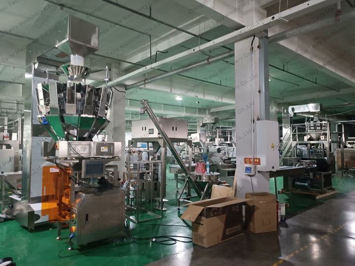 How to Reduce Product Giveaway in Automatic Weighing? 14 Corn stick packaging machine with 10 head weigher